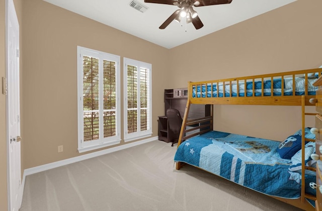 2005 Mistwood Ct, Pearland, TX 77584 - carpeted bedroom with baseboards and a ceiling fan