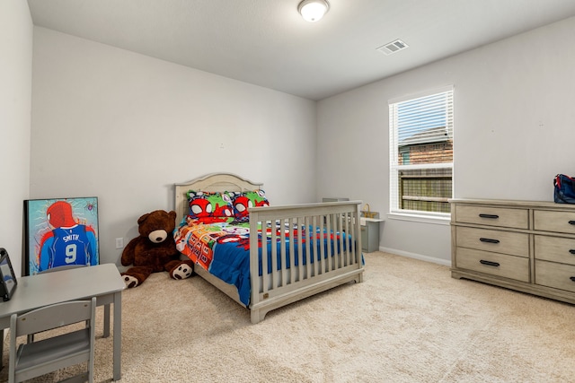 77 Indian Wells Dr, Manvel, TX 77578 - bedroom with carpet floors and baseboards