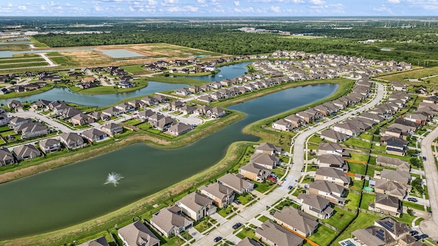 77 Indian Wells Dr, Manvel, TX 77578 - aerial overview of property's location featuring nearby suburban area and a nearby body of water