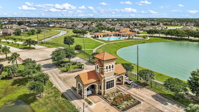 77 Indian Wells Dr, Manvel, TX 77578 - aerial view of residential area with a large body of water