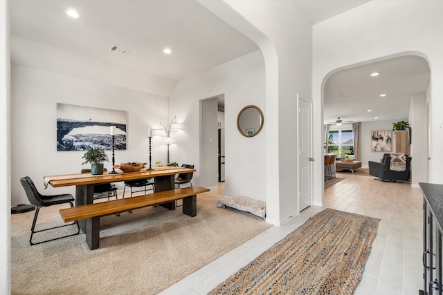 77 Indian Wells Dr, Manvel, TX 77578 - dining space featuring arched walkways, recessed lighting, and a ceiling fan
