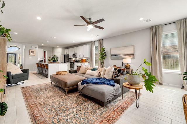 77 Indian Wells Dr, Manvel, TX 77578 - living room featuring ceiling fan, recessed lighting, and baseboards