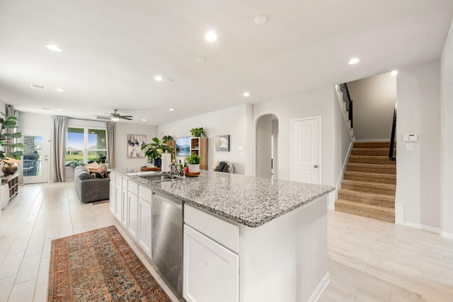77 Indian Wells Dr, Manvel, TX 77578 - kitchen featuring arched walkways, a sink, dishwasher, a ceiling fan, and recessed lighting