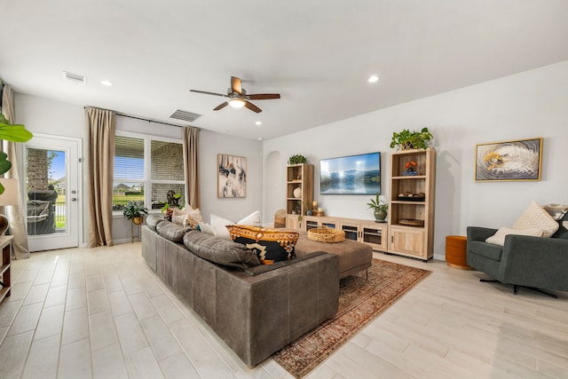 77 Indian Wells Dr, Manvel, TX 77578 - living area with light wood-type flooring, ceiling fan, and recessed lighting