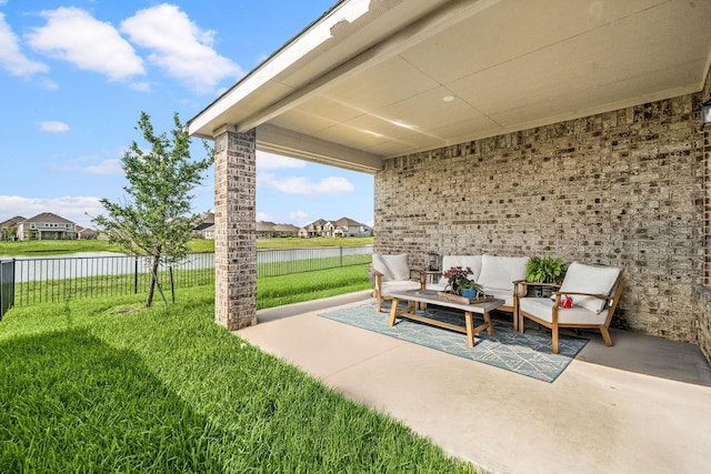 77 Indian Wells Dr, Manvel, TX 77578 - view of patio / terrace with a water view and outdoor lounge area