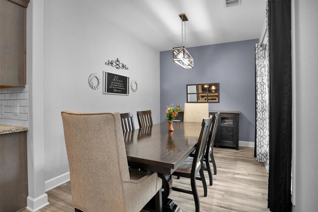 4142 Longhorn Dr, Cleveland, TX 77328 - dining area featuring light wood-style floors and baseboards