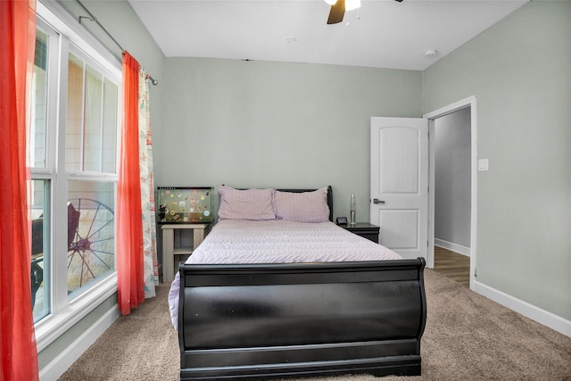 4142 Longhorn Dr, Cleveland, TX 77328 - carpeted bedroom featuring baseboards and a ceiling fan