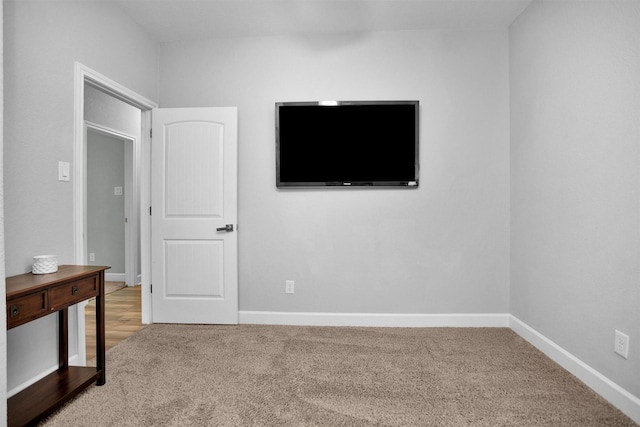 4142 Longhorn Dr, Cleveland, TX 77328 - unfurnished bedroom featuring carpet floors and baseboards