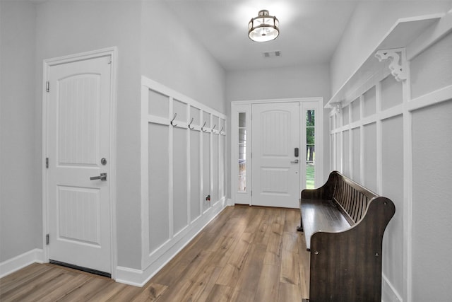 4142 Longhorn Dr, Cleveland, TX 77328 - mudroom featuring wood finished floors and baseboards