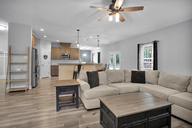 4142 Longhorn Dr, Cleveland, TX 77328 - living room with recessed lighting, light wood-style flooring, and a ceiling fan