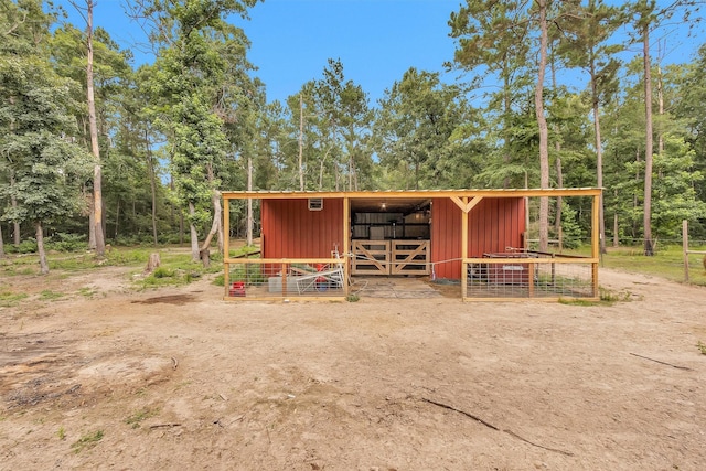 4142 Longhorn Dr, Cleveland, TX 77328 - view of outbuilding with an exterior structure