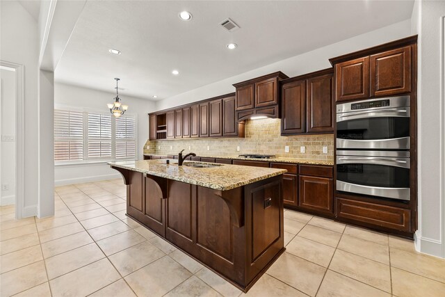 4510 Cedarfield Rd, Katy, TX 77494 - kitchen with appliances with stainless steel finishes, a sink, open shelves, decorative backsplash, and a chandelier
