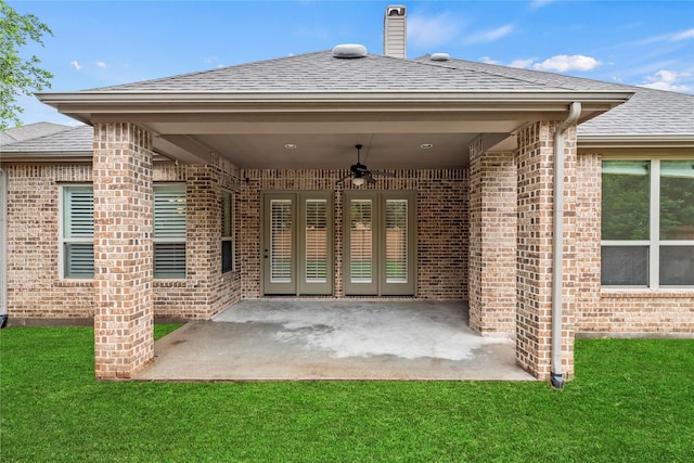4510 Cedarfield Rd, Katy, TX 77494 - back of property featuring brick siding, a yard, ceiling fan, a shingled roof, and a patio