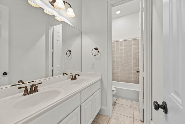 4510 Cedarfield Rd, Katy, TX 77494 - bathroom with toilet, double vanity, tile patterned floors, and shower / washtub combination
