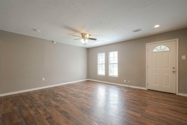 3915 Florinda St, Houston, TX 77021 - entryway featuring ceiling fan, baseboards, a textured ceiling, dark wood finished floors, and recessed lighting