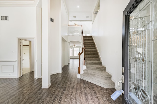 22011 Twinkle Sky Ct, Cypress, TX 77433 - entrance foyer with stairway, dark wood-type flooring, a towering ceiling, and baseboards