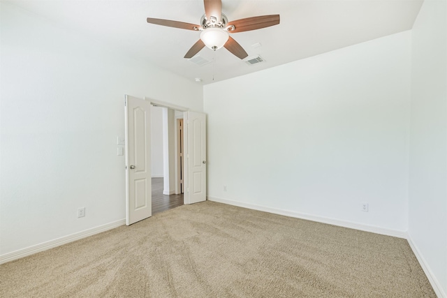 22011 Twinkle Sky Ct, Cypress, TX 77433 - unfurnished room with light colored carpet, a ceiling fan, and baseboards