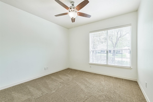 22011 Twinkle Sky Ct, Cypress, TX 77433 - empty room with light colored carpet, baseboards, and ceiling fan