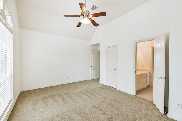 22011 Twinkle Sky Ct, Cypress, TX 77433 - unfurnished bedroom with light colored carpet, connected bathroom, high vaulted ceiling, baseboards, and a ceiling fan