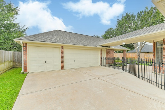 22011 Twinkle Sky Ct, Cypress, TX 77433 - view of front of house featuring brick siding, roof with shingles, concrete driveway, and a garage