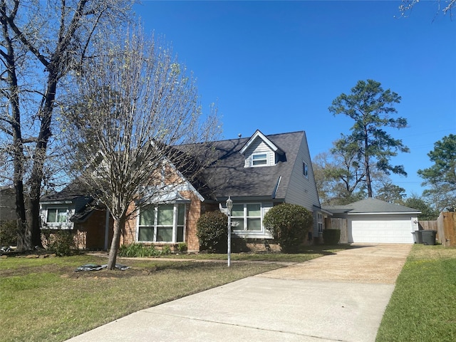 28811 Enchanted Dr, Shenandoah, TX 77381 - view of front facade with driveway, an attached garage, and roof with shingles