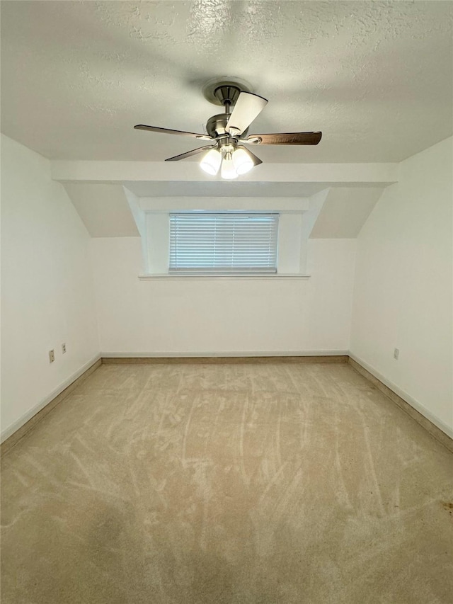 28811 Enchanted Dr, Shenandoah, TX 77381 - additional living space featuring carpet flooring, a textured ceiling, a ceiling fan, and baseboards