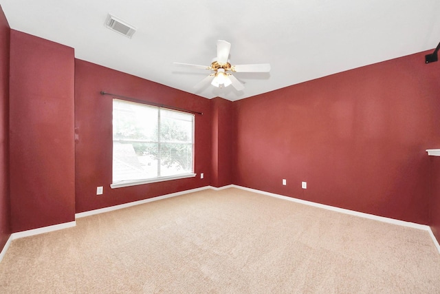 7115 Blanco Pines Dr, Humble, TX 77346 - unfurnished room with carpet flooring, baseboards, and ceiling fan