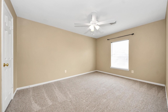 7115 Blanco Pines Dr, Humble, TX 77346 - unfurnished room featuring carpet flooring, baseboards, and a ceiling fan