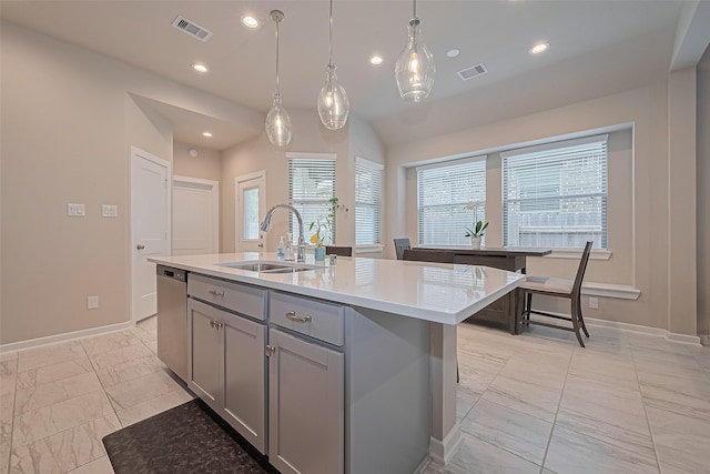 24227 Tallgrass Meadow Trl, Katy, TX 77493 - kitchen with a sink, gray cabinets, light marble finish floors, stainless steel dishwasher, and light countertops