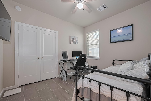 24227 Tallgrass Meadow Trl, Katy, TX 77493 - bedroom with a desk, ceiling fan, baseboards, a closet, and dark tile patterned flooring
