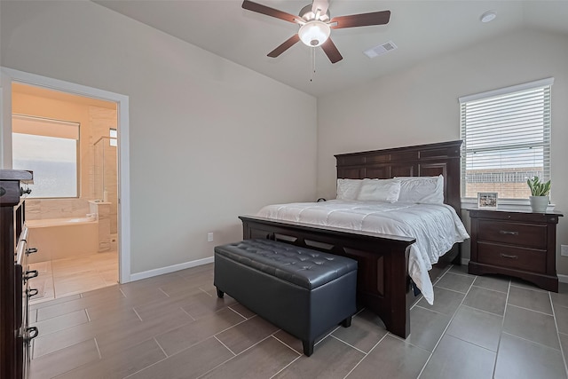 24227 Tallgrass Meadow Trl, Katy, TX 77493 - bedroom with vaulted ceiling, ensuite bath, baseboards, and ceiling fan