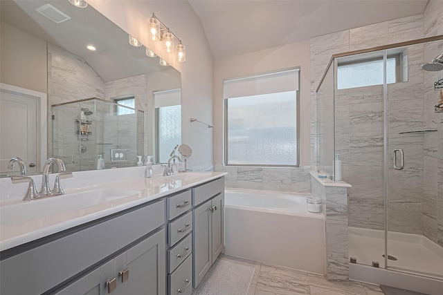 24227 Tallgrass Meadow Trl, Katy, TX 77493 - full bathroom featuring a garden tub, lofted ceiling, a stall shower, double vanity, and marble finish floors