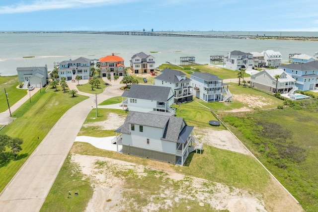 714 Vista Bella, Galveston, TX 77554 - aerial view of residential area with a nearby body of water and a notable bridge