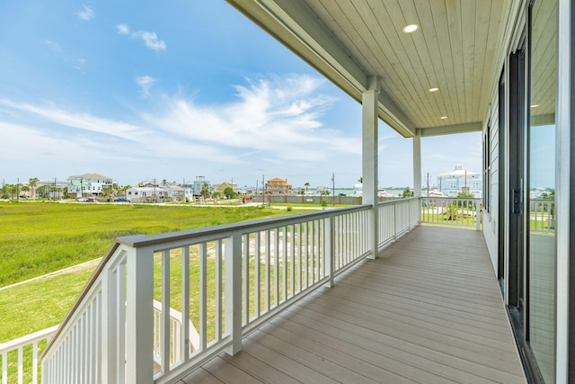 714 Vista Bella, Galveston, TX 77554 - wooden terrace with a lawn
