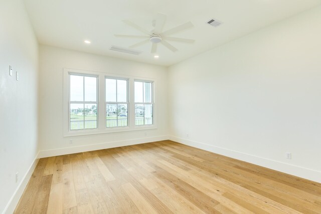 714 Vista Bella, Galveston, TX 77554 - unfurnished room with light wood finished floors, baseboards, ceiling fan, and recessed lighting