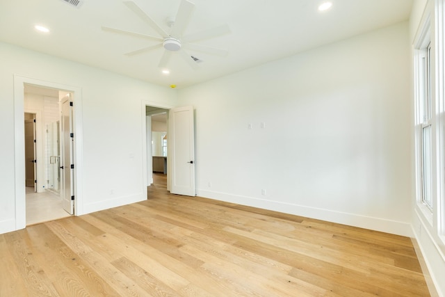 714 Vista Bella, Galveston, TX 77554 - unfurnished bedroom featuring baseboards, light wood-style flooring, recessed lighting, a ceiling fan, and ensuite bath
