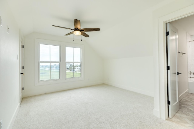 714 Vista Bella, Galveston, TX 77554 - additional living space featuring vaulted ceiling, light colored carpet, ceiling fan, and baseboards