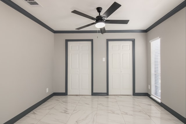 11835 S Ridgewood Cir, Houston, TX 77071 - unfurnished bedroom with baseboards, multiple windows, light marble finish flooring, and ornamental molding