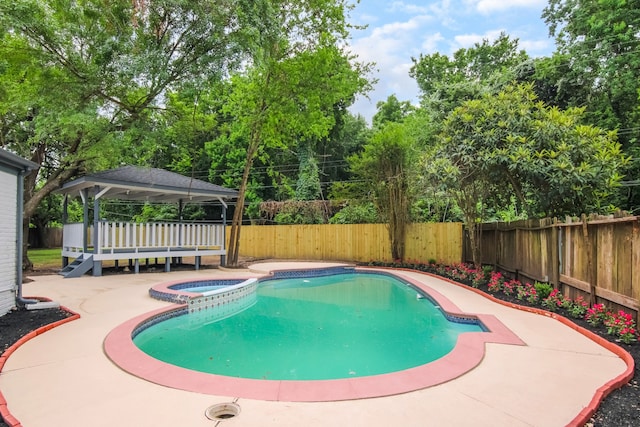 11835 S Ridgewood Cir, Houston, TX 77071 - view of swimming pool featuring a fenced backyard and a pool with connected hot tub