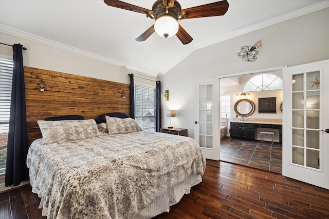 16418 Willowpark Dr, Tomball, TX 77377 - bedroom with french doors, crown molding, multiple windows, lofted ceiling, and dark wood finished floors