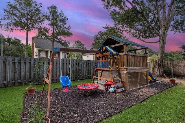 16418 Willowpark Dr, Tomball, TX 77377 - playground at dusk featuring a playground