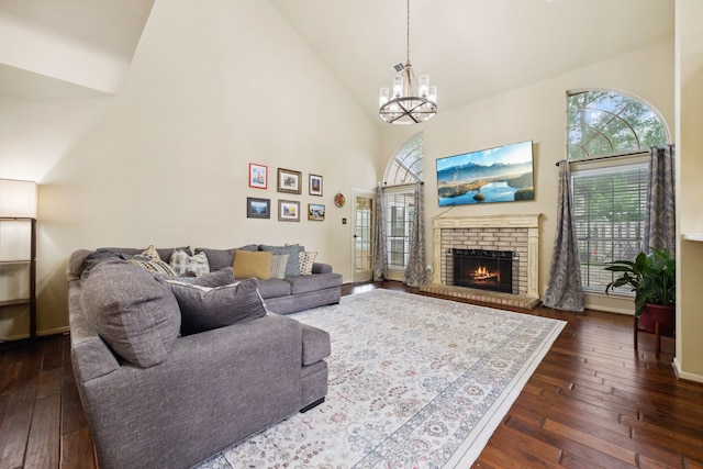 16418 Willowpark Dr, Tomball, TX 77377 - living room with high vaulted ceiling, dark wood-type flooring, plenty of natural light, and a chandelier