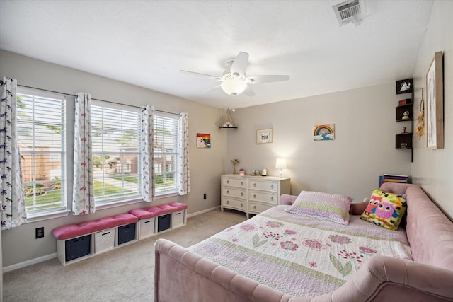 16418 Willowpark Dr, Tomball, TX 77377 - bedroom featuring light colored carpet, baseboards, and a ceiling fan