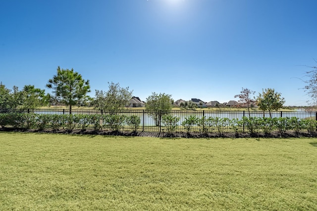 30411 Indigo Falls Dr, Brookshire, TX 77423 - view of yard with a water view and a residential view