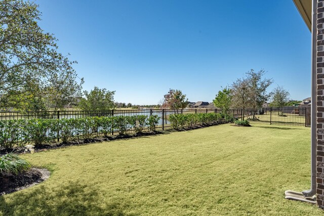 30411 Indigo Falls Dr, Brookshire, TX 77423 - view of yard with a water view