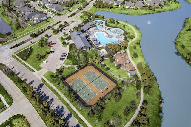 30411 Indigo Falls Dr, Brookshire, TX 77423 - aerial view of property and surrounding area with a nearby body of water, a pool area, and nearby suburban area