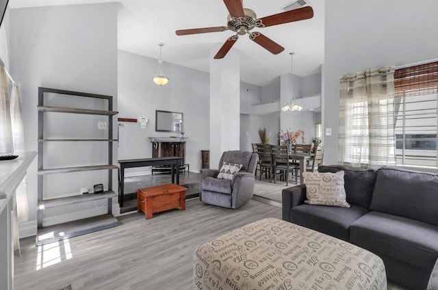 5418 Forest Springs Dr, Houston, TX 77339 - living area featuring ceiling fan, a high ceiling, and wood finished floors