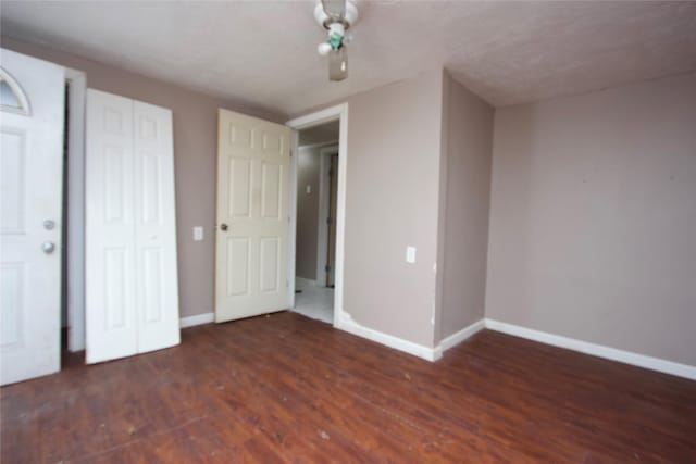4604 Octavia St, Houston, TX 77026 - unfurnished bedroom featuring baseboards and wood finished floors