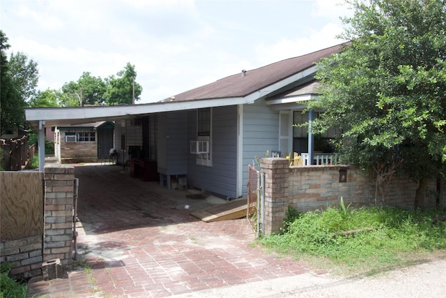 4604 Octavia St, Houston, TX 77026 - view of front of house featuring an attached carport