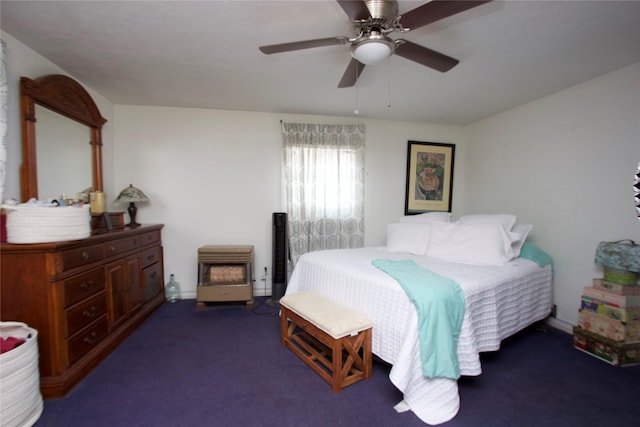 4604 Octavia St, Houston, TX 77026 - carpeted bedroom featuring a ceiling fan and baseboards